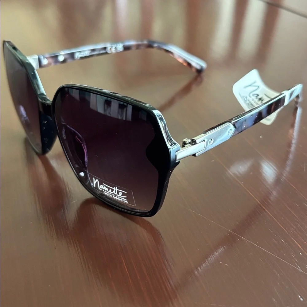 Nanette Lepore 100% UV protect,black frame,tortoise arms,black lens sunglasses